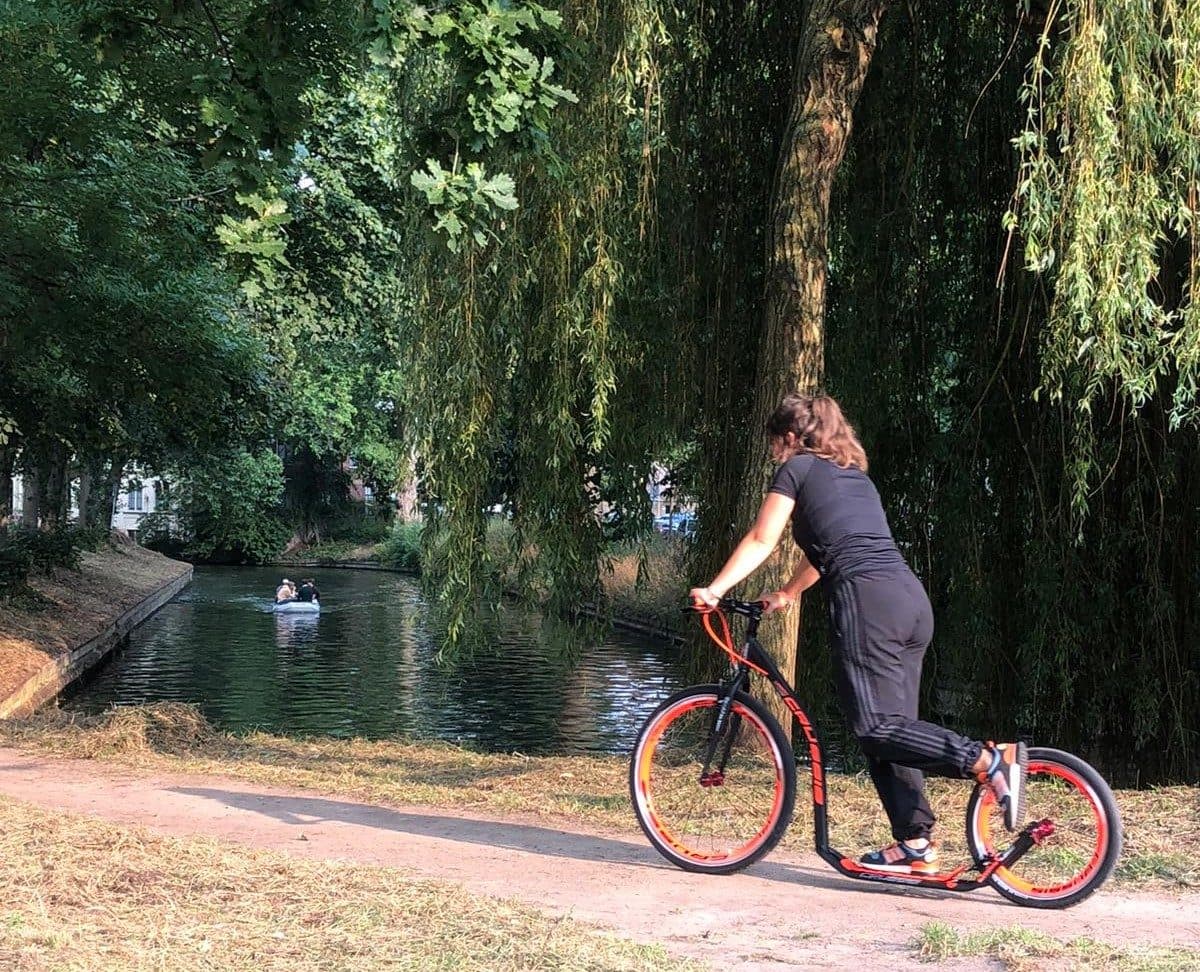 Kickbike by the water in a Utrecht park